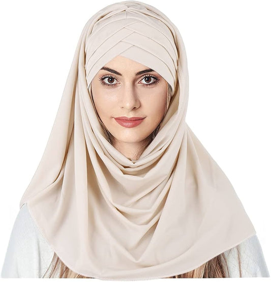 Comment porter un foulard de manière élégante ? Simplicité, fluidité et justesse